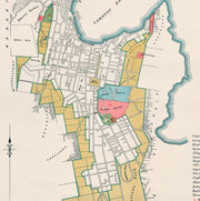 A richly detailed 1899 vintage map of Wellington showing the city’s early streets, harbour curves, and historic landmarks.