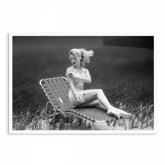 1940s vintage underwater photo of a model applying suntan lotion beneath the waves in retro swimwear, showcasing timeless underwater photography and vintage glamour.